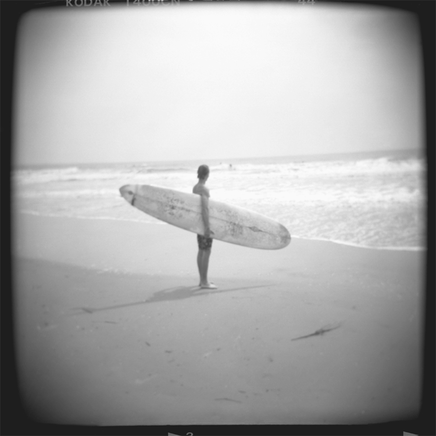 ToyCamera-DanielGrant-SandPeople-longboard